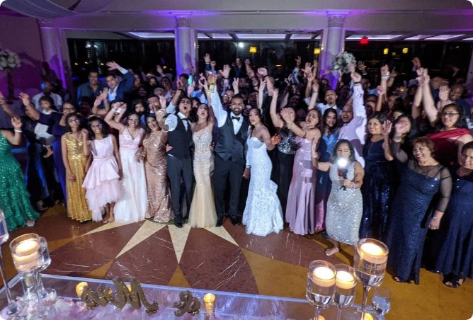 Wedding guests filling the dance floor